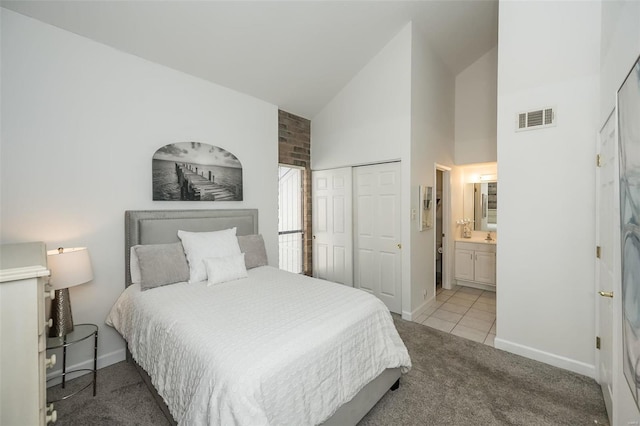 632 Coeur De Royale Dr Unit C, Saint Louis, MO 63141 - bedroom with baseboards, carpet floors, high vaulted ceiling, a closet, and ensuite bathroom