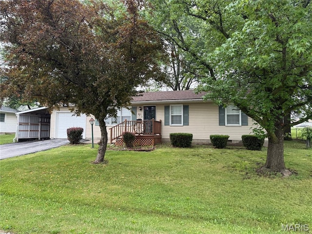 15 W Bibb Dr, Bowling Green, MO 63334 - view of front of house featuring asphalt driveway, a front lawn, a carport, and crawl space