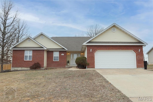 20981 Lacombe Rd, Waynesville, MO 65583 - view of front of property with an attached garage, concrete driveway, brick siding, and a shingled roof