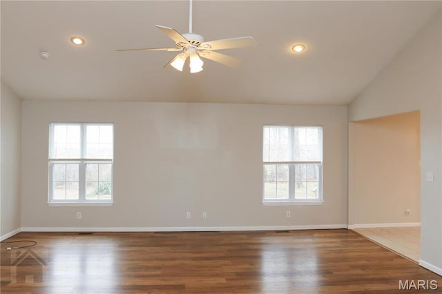 20981 Lacombe Rd, Waynesville, MO 65583 - empty room featuring vaulted ceiling, wood finished floors, ceiling fan, baseboards, and recessed lighting