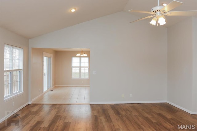 20981 Lacombe Rd, Waynesville, MO 65583 - spare room with a chandelier, wood finished floors, baseboards, a ceiling fan, and recessed lighting