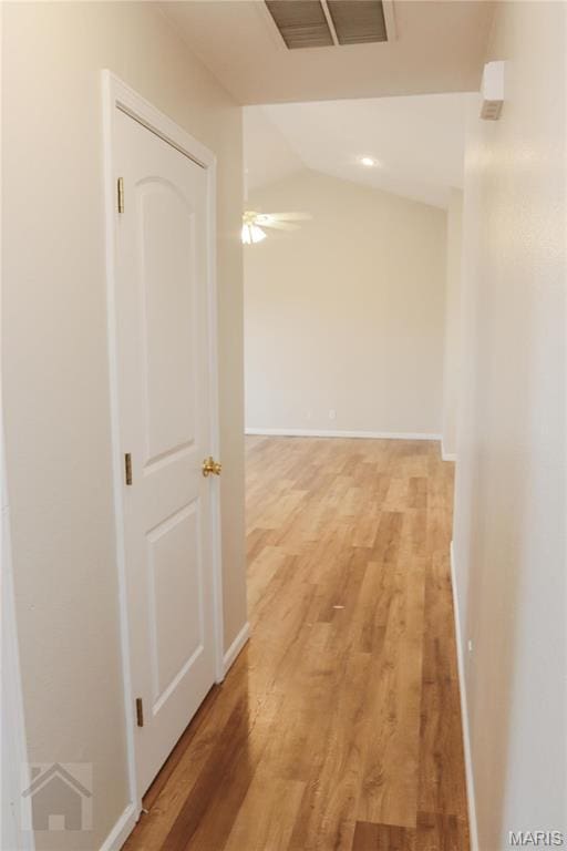 20981 Lacombe Rd, Waynesville, MO 65583 - corridor featuring light wood finished floors and baseboards
