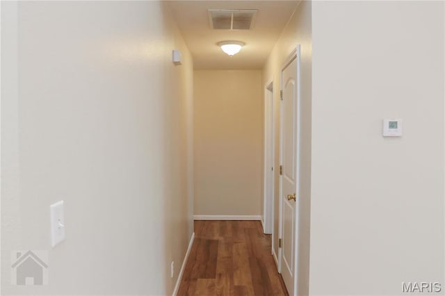 20981 Lacombe Rd, Waynesville, MO 65583 - corridor featuring wood finished floors and baseboards