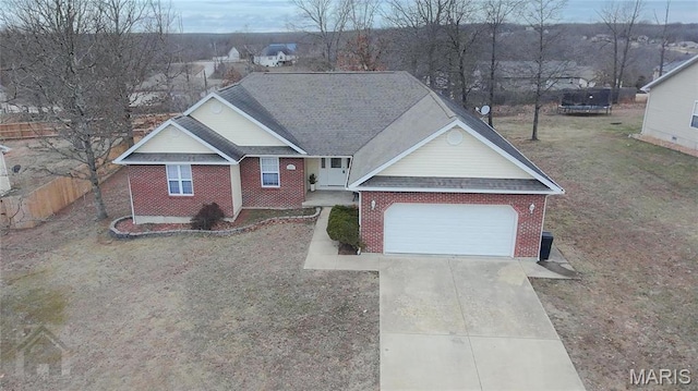 20981 Lacombe Rd, Waynesville, MO 65583 - ranch-style home featuring brick siding, a garage, concrete driveway, and roof with shingles