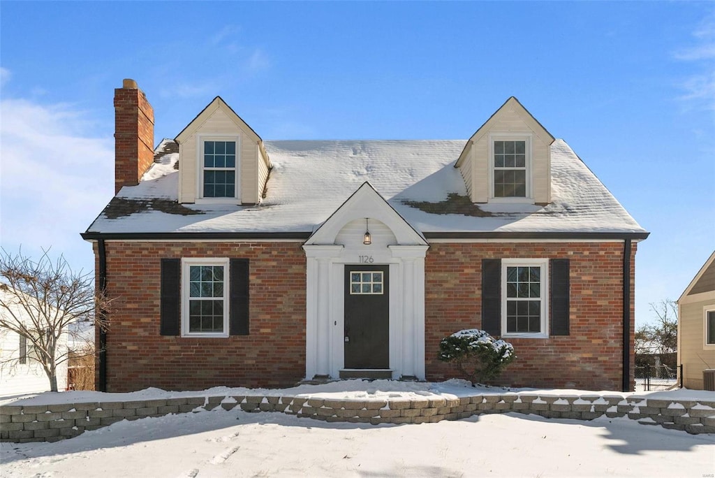 1126 Bopp Rd, Saint Louis, MO 63131 - view of front of home with brick siding and a chimney