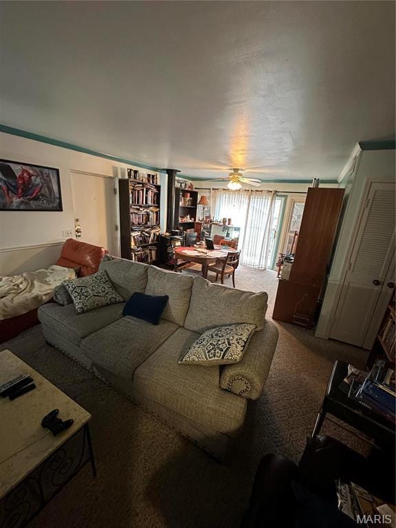 4290 Chateau De Ville Dr Unit G, Saint Louis, MO 63129 - carpeted living room with ceiling fan and crown molding
