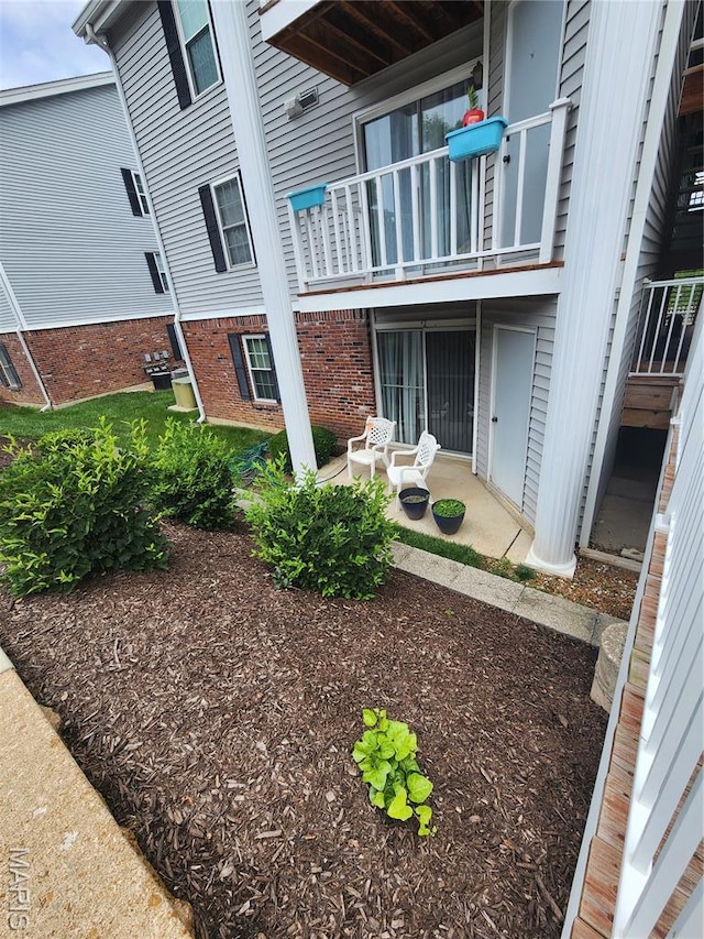 1239 Creve Coeur Crossing Ln Unit C, Chesterfield, MO 63017 - exterior space with a balcony and a patio