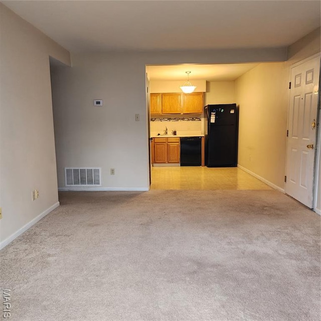 1239 Creve Coeur Crossing Ln Unit C, Chesterfield, MO 63017 - unfurnished living room with light carpet and a sink