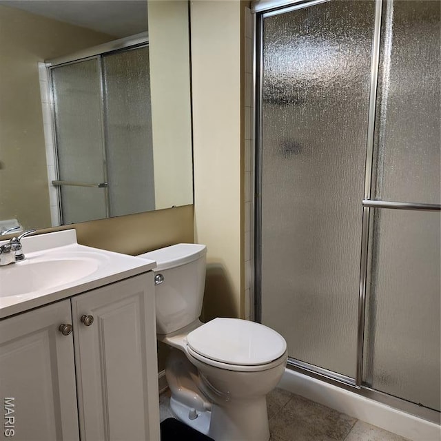 1239 Creve Coeur Crossing Ln Unit C, Chesterfield, MO 63017 - bathroom featuring vanity, a shower stall, and tile patterned floors