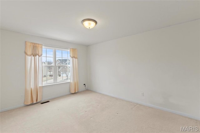 1 Ashbury Crossing Ct, Florissant, MO 63034 - unfurnished room with baseboards and carpet