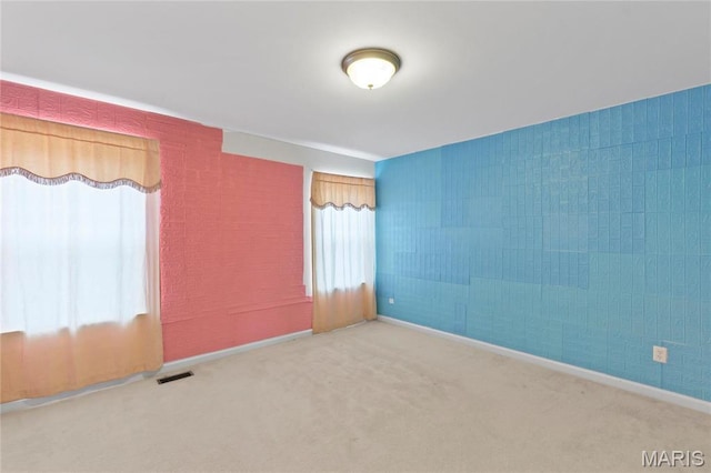 1 Ashbury Crossing Ct, Florissant, MO 63034 - empty room featuring carpet floors and baseboards
