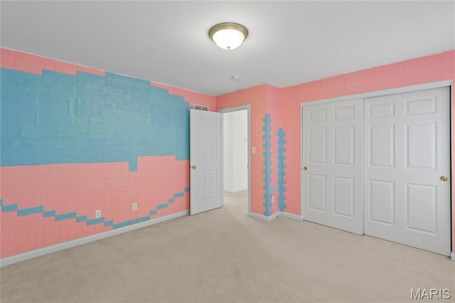 1 Ashbury Crossing Ct, Florissant, MO 63034 - unfurnished bedroom with carpet flooring, baseboards, and a closet