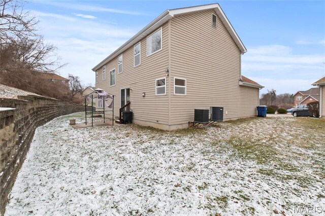 1 Ashbury Crossing Ct, Florissant, MO 63034 - back of house with central air condition unit