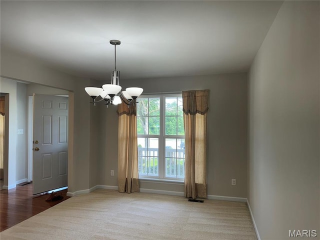 1 Ashbury Crossing Ct, Florissant, MO 63034 - carpeted spare room with a chandelier and baseboards