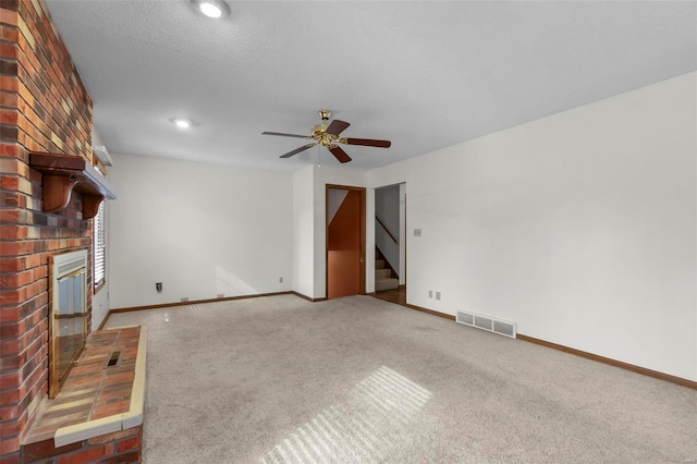 2013 Lee Dr, Cape Girardeau, MO 63701 - unfurnished living room featuring carpet, stairs, ceiling fan, baseboards, and recessed lighting