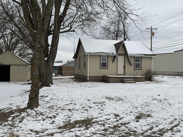 1355 Springfield Rd, Lebanon, MO 65536 - view of side of property with stucco siding