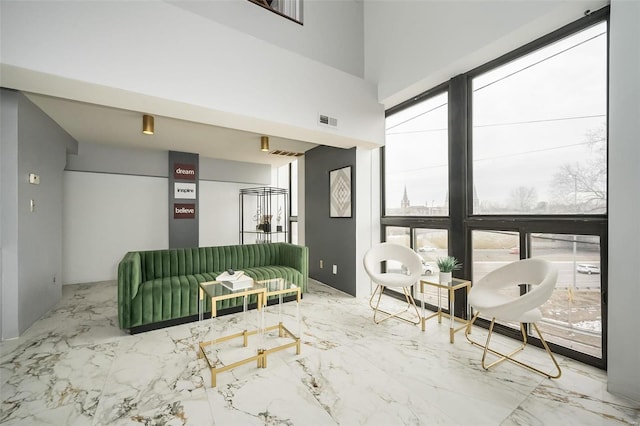 1523 S 10th St Unit 207, Saint Louis, MO 63101 - living area with marble tiled floors