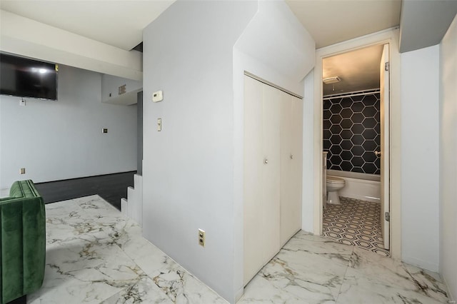 1523 S 10th St Unit 207, Saint Louis, MO 63101 - hallway featuring marble finish flooring