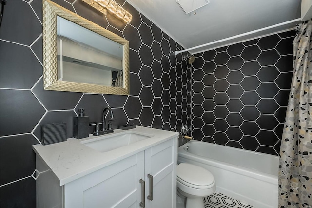 1523 S 10th St Unit 207, Saint Louis, MO 63101 - bathroom featuring tile walls, shower / tub combo with curtain, toilet, vanity, and tasteful backsplash