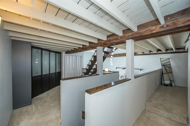 1523 S 10th St Unit 207, Saint Louis, MO 63101 - interior space with beam ceiling and stairs