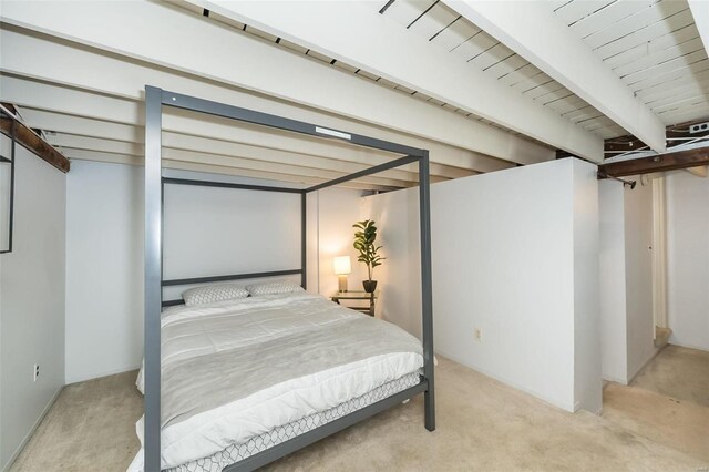 1523 S 10th St Unit 207, Saint Louis, MO 63101 - bedroom featuring carpet flooring and beamed ceiling