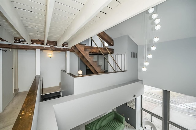 1523 S 10th St Unit 207, Saint Louis, MO 63101 - stairway featuring beamed ceiling