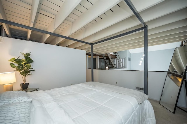 1523 S 10th St Unit 207, Saint Louis, MO 63101 - bedroom featuring carpet and beam ceiling