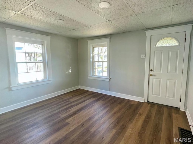 9411 Muriel Ave, Saint Louis, MO 63114 - foyer entrance with baseboards, a drop ceiling, and dark wood finished floors