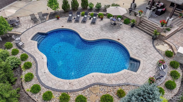 130 Foristell Ridge Ct, Foristell, MO 63348 - swimming pool with a patio area