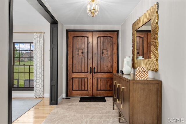 130 Foristell Ridge Ct, Foristell, MO 63348 - entrance foyer with baseboards and a chandelier