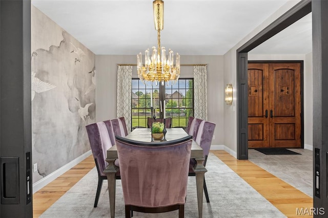 130 Foristell Ridge Ct, Foristell, MO 63348 - dining area with a chandelier and wood finished floors