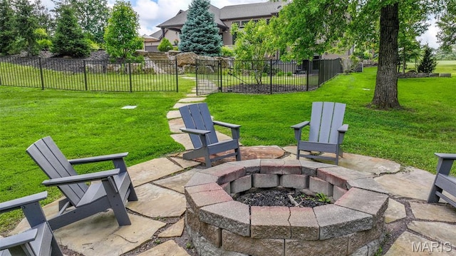 130 Foristell Ridge Ct, Foristell, MO 63348 - view of patio featuring an outdoor fire pit