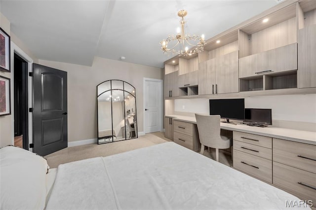 130 Foristell Ridge Ct, Foristell, MO 63348 - bedroom with built in study area, a chandelier, and light colored carpet