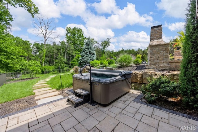 130 Foristell Ridge Ct, Foristell, MO 63348 - view of patio featuring a hot tub