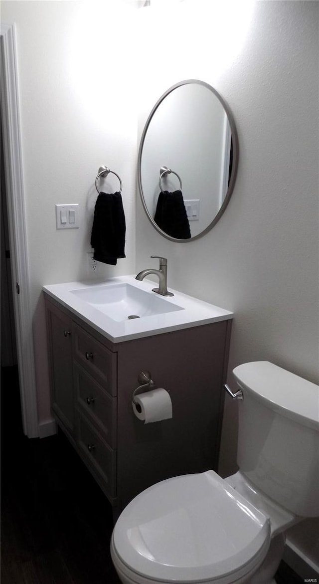 1002 Cypress Dr, Rolla, MO 65401 - bathroom featuring vanity and toilet