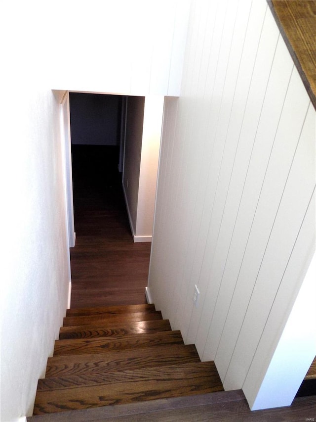 1002 Cypress Dr, Rolla, MO 65401 - staircase featuring wood finished floors