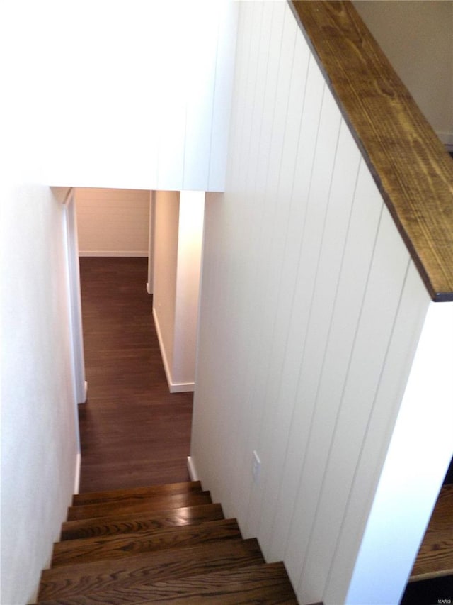 1002 Cypress Dr, Rolla, MO 65401 - stairs featuring wood finished floors and baseboards