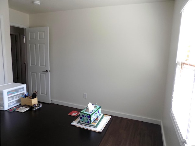 1002 Cypress Dr, Rolla, MO 65401 - misc room featuring plenty of natural light, baseboards, and dark wood-style flooring