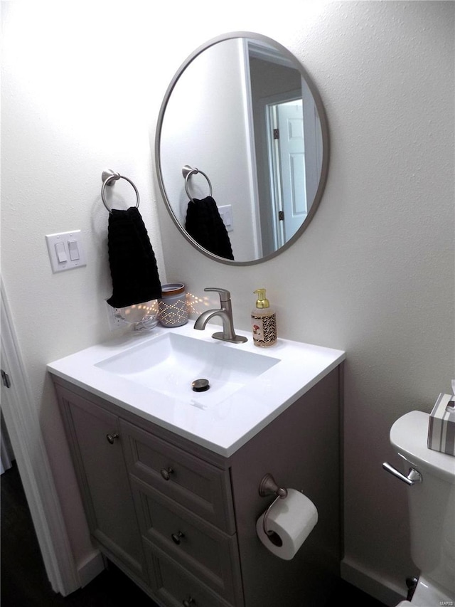 1002 Cypress Dr, Rolla, MO 65401 - half bath featuring vanity and toilet