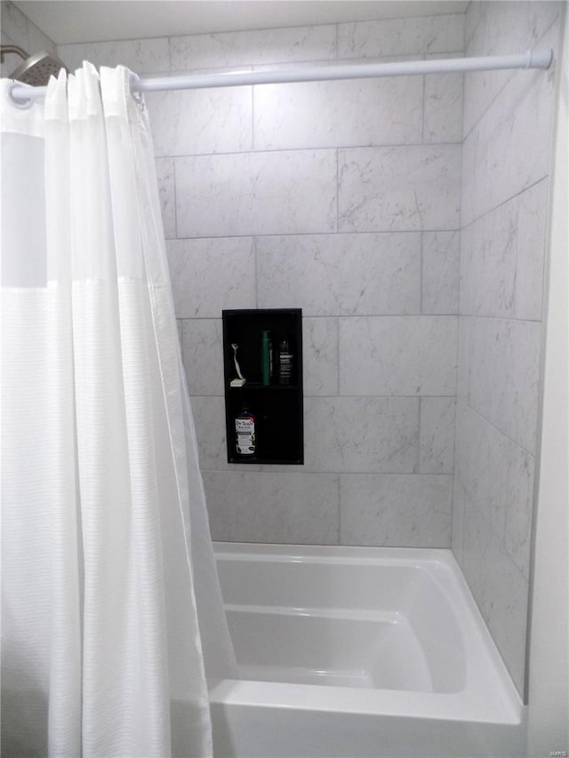 1002 Cypress Dr, Rolla, MO 65401 - bathroom featuring shower / bath combination with curtain