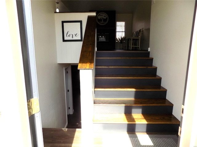 1002 Cypress Dr, Rolla, MO 65401 - stairs featuring wood finished floors