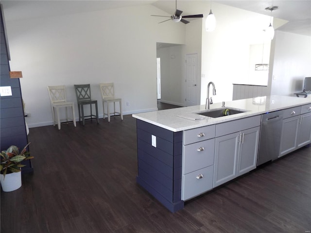 1002 Cypress Dr, Rolla, MO 65401 - kitchen with a sink, stainless steel dishwasher, dark wood-style flooring, ceiling fan, and open floor plan