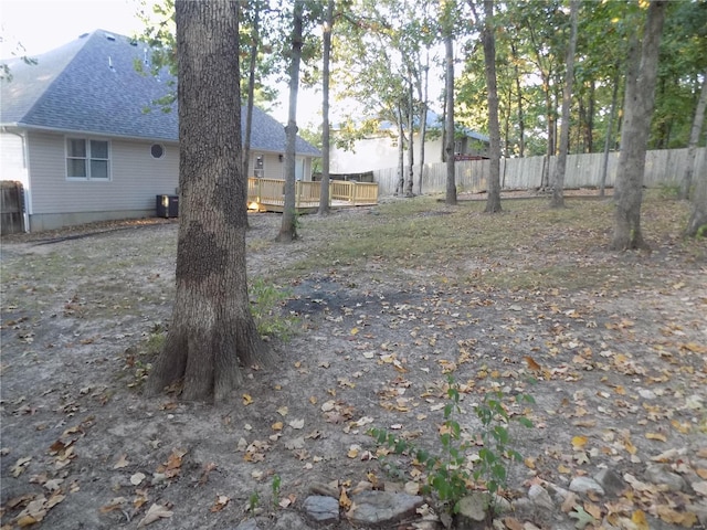 1002 Cypress Dr, Rolla, MO 65401 - view of yard with fence and a deck