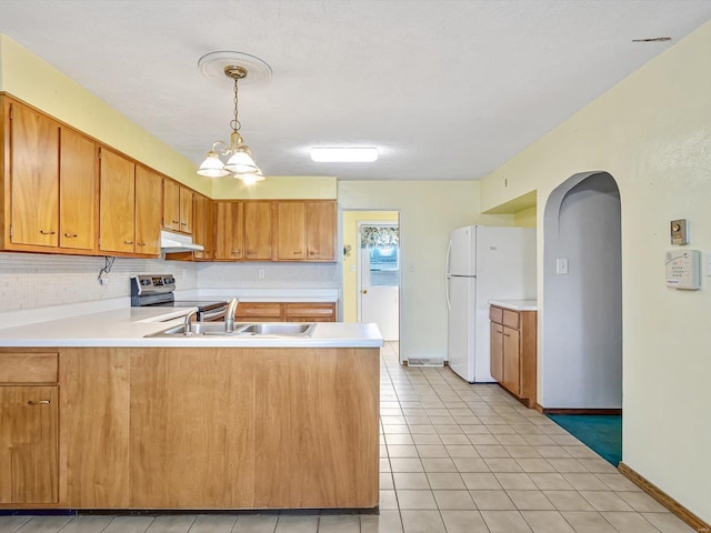 9355 State Route 3, Red Bud, IL 62278 - kitchen featuring stainless steel electric range oven, a sink, under cabinet range hood, a peninsula, and light countertops