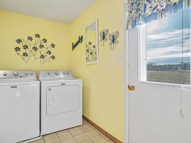 9355 State Route 3, Red Bud, IL 62278 - washroom featuring washer and dryer, light tile patterned flooring, and baseboards