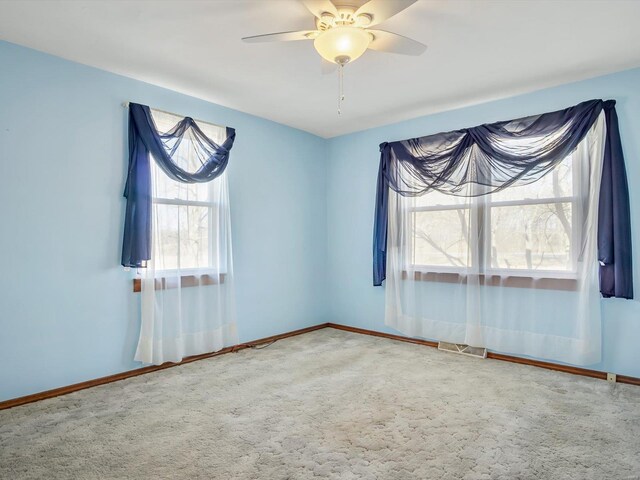 9355 State Route 3, Red Bud, IL 62278 - empty room with carpet flooring, a ceiling fan, and baseboards