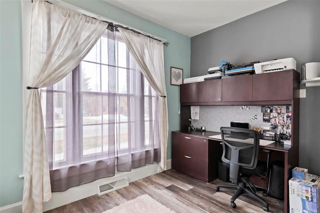 821 N State St, Litchfield, IL 62056 - office space featuring light wood-style floors