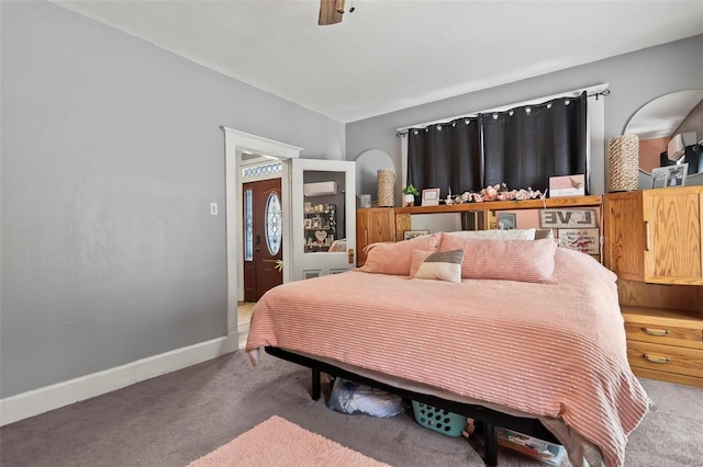 821 N State St, Litchfield, IL 62056 - carpeted bedroom with baseboards and a ceiling fan