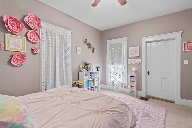 821 N State St, Litchfield, IL 62056 - carpeted bedroom featuring a ceiling fan and baseboards