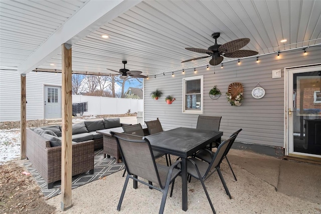 821 N State St, Litchfield, IL 62056 - view of patio with ceiling fan, outdoor lounge area, fence, and outdoor dining area